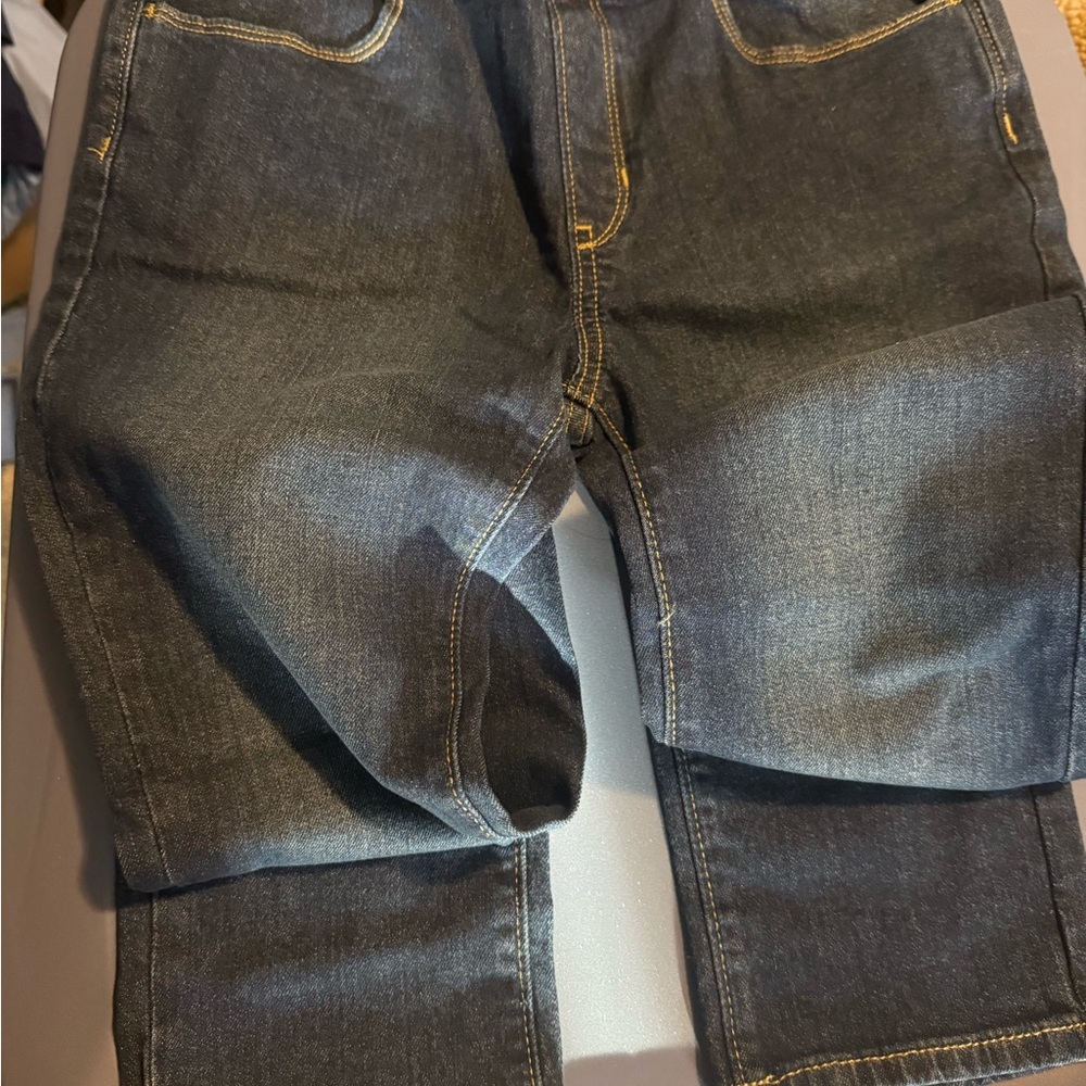 2 pair girls jeans . 1 Dark Blue Skinny Jeans and 1 black boot cut jeans.